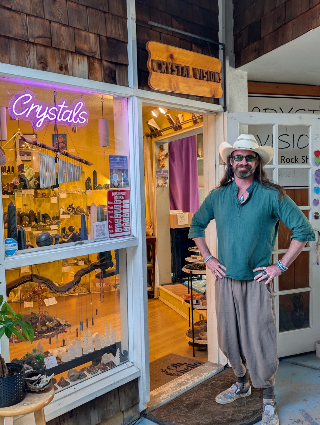 Philip Berry standing outside Crystal Visions Rock Shop in Ocean Beach, San Diego
